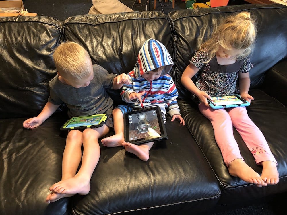children developing with screen time